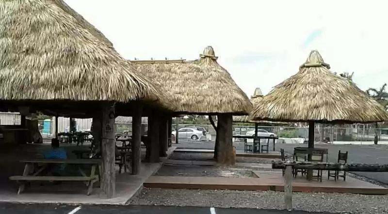 Restaurant Tiki Huts with a Steep Roof Pitch
